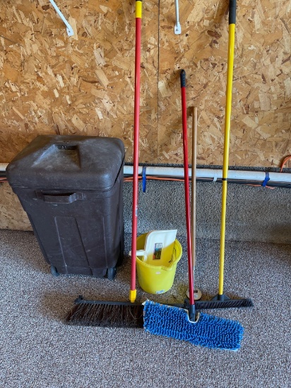Plastic trash can, shop broom, window cleaner, magnet, tote.