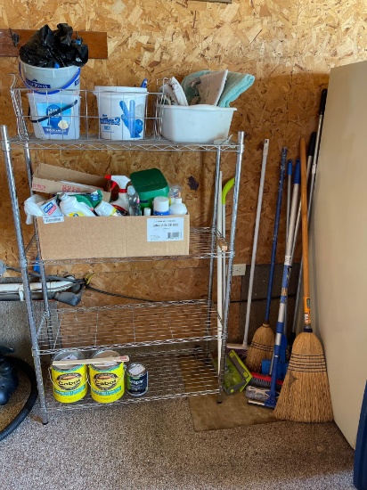 Stainless steel 4 shelf shelving, cleaning supplies, brooms, etc.