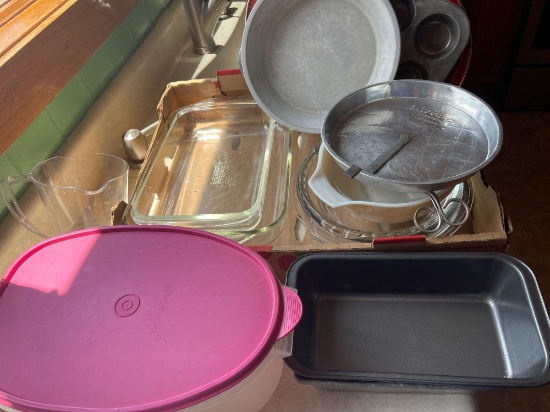 Pyrex glass baking dishes, glass pie plates, baking tins, pie tin, tupperware container.