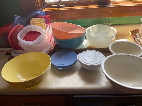 Tupperware containers, mixing bowls, popcorn bowl.