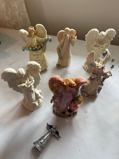 Angel figurines.... Shipping