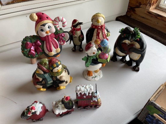 Battery operated penguin drummer and assorted figurines
