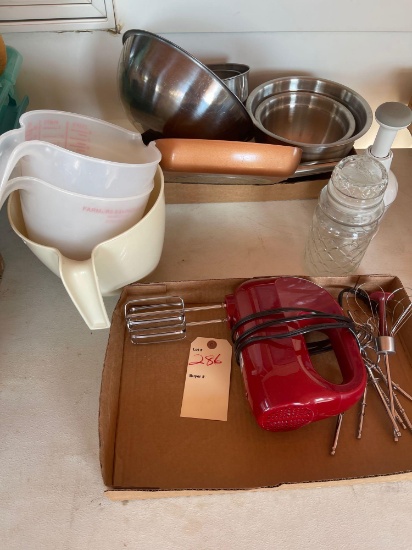 Oster...hand held mixer with mixing bowls and accessories