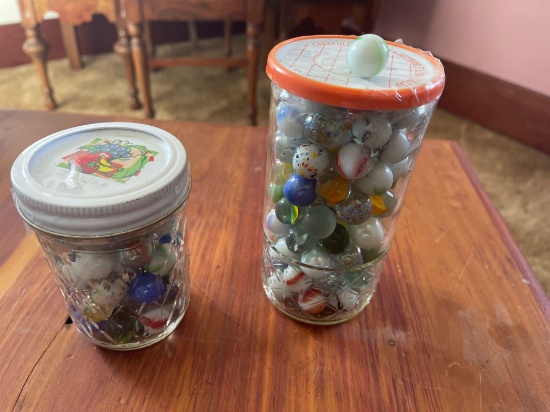 2 jars of marbles.... Shipping