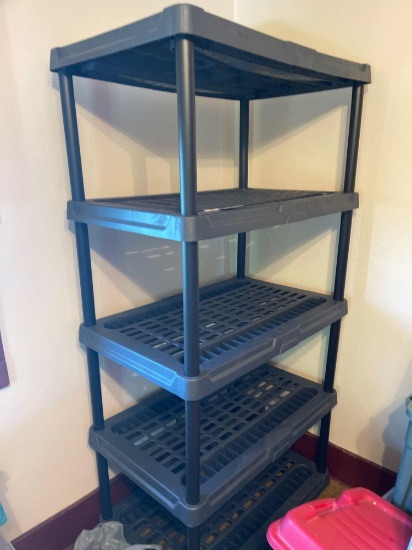 Plastic five shelf shelving unit.