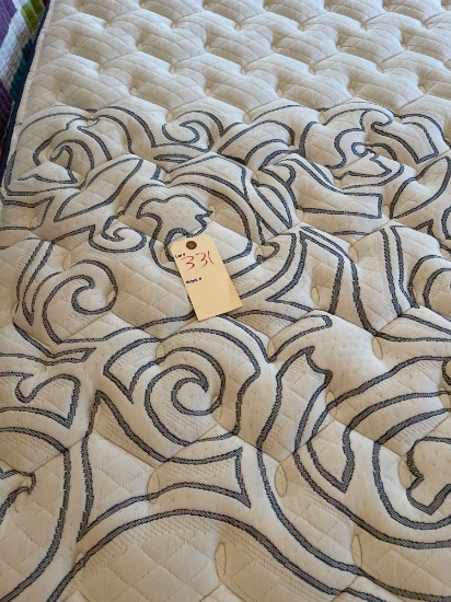King size bed on split platform frame.