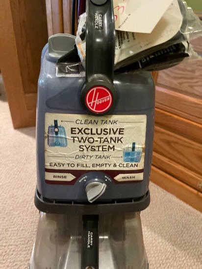 Hoover Exclusive two tank system carpet cleaner.