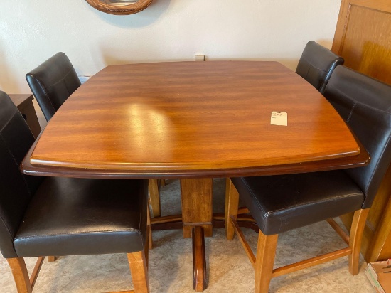 Square hightop curved edge table with center pedestal, four chairs. ( Really nice).