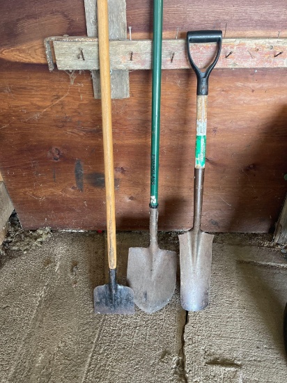 Spade, sand shovel with fiberglass handle, ice scraper.