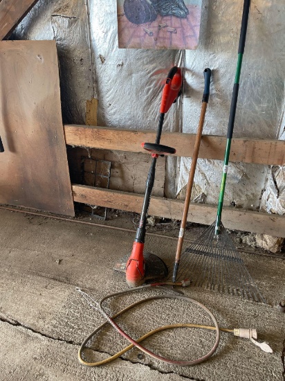 Black and decker grasshopper 18 V cordless weedeater, Charger with extra battery, hoe, rake, 8 foot
