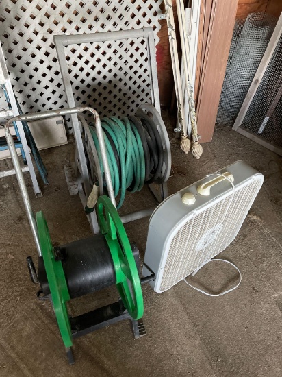2 hose reels, hose and box fan