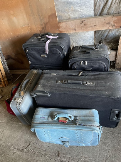 Misc. luggage and wooden spindle chair