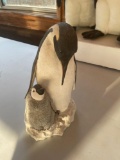 Cement penguin and young