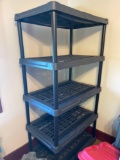 Plastic five shelf shelving unit.
