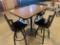 30'' x 40'' x 42'' high Metal pedestal laminate top table with 4 swivel bar chairs. A few wear spots