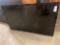 Sharp 70'' flat screen TV with brackets. No shipping available