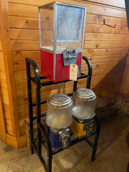 Rhino vending machine including 2 gumball dispensers and 1 candy dispenser with stand. Nice