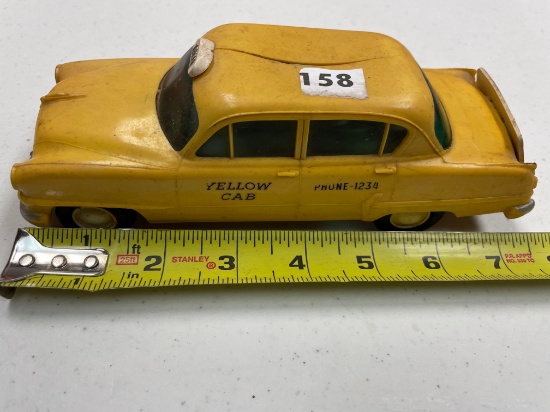 tru-Miniature Plymouth Taxi, hard plastic, metal undercarriage, crack in top