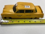 tru-Miniature Plymouth Taxi, hard plastic, metal undercarriage, crack in top