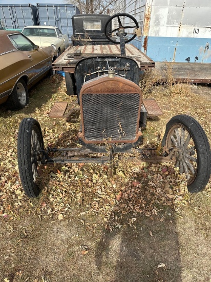 1920's truck with flatbed, wood spoke wheels, not title and non runner