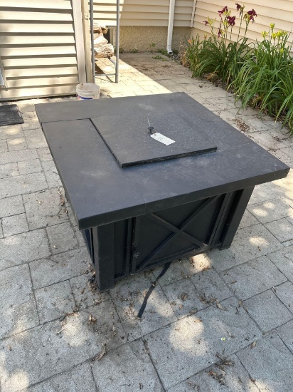Outdoor propane fireplace. ...