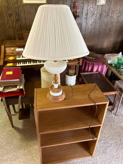 Desk lamp and 3 shelf wooden bookcase.