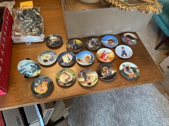 Numerous small painted plates of children for display with plate holders, misc.Shipping