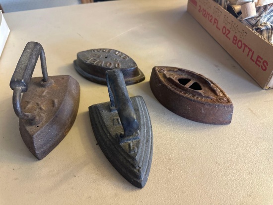 Various sad irons.