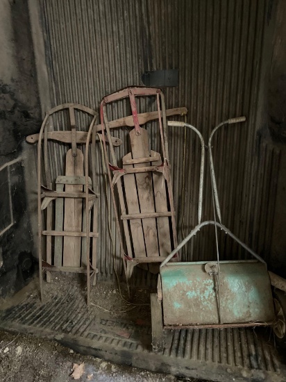 2 Wood sleds and Lawn Spreader