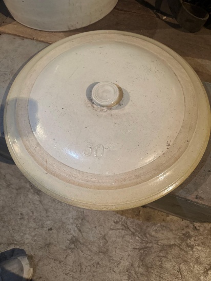No. 30 crock lid.... Excellent condition.... Shipping.... If this lid brings enough money I would co