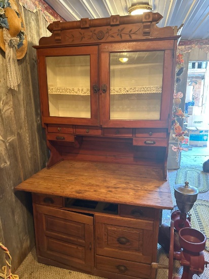 Antique Hutch with spoon carving, rounded bottom drawers..