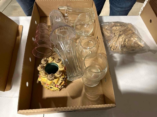 various glass vases and wine glasses