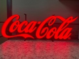 Lighted Coca-Cola sign, 28'' W x 10'' T