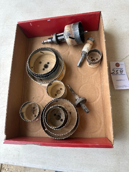 Various size hole sawswith interchangeable nut driver attachment
