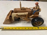 Handcrafted wood tractor loader and man