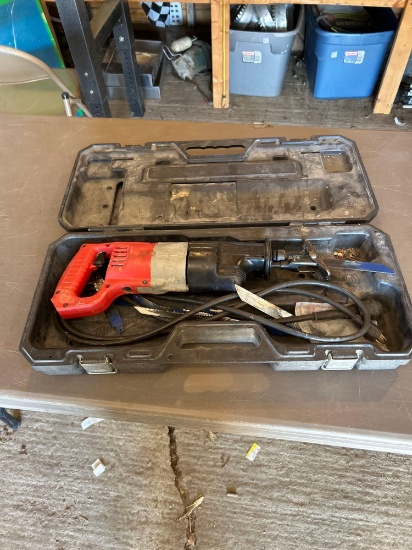Milwaukee corded sawzall, blades included