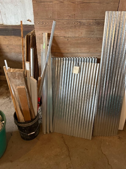 Assorted lumber in bucket, decorative tin, assorted plywood