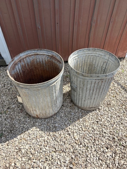 2 steel trash cans