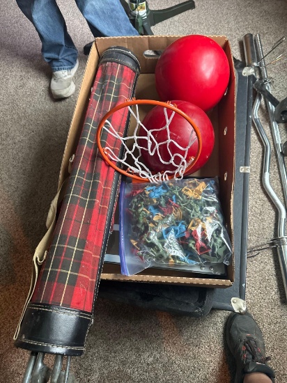Golf clubs, toy soldiers, weighted medicine balls, basketball hoop