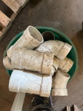 Tub of large PVC fittings