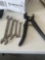 Crescent wrench, box end and open end wrenches, welding clamp, etc.