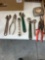 Crescent wrenches , tape measure, pliers, ratchet wrench, tin snips.