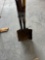 Potato fork and two flat sand shovels.