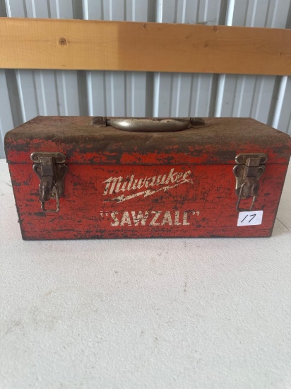 Milwaukee electric sawzall, extra blades in case.