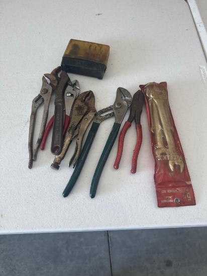 Five piece open end wrench set, channel locks, pliers, vice grip, hex keys.