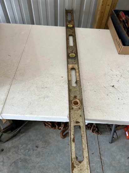 Level, metal gas can, bolt cutter.