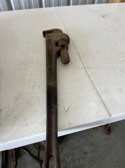 18'' and 24'' pipe wrenches, large crow bar.