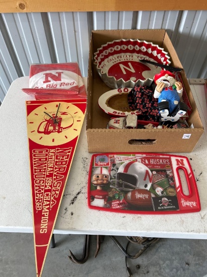 Nebraska Huskers merchandise, flag clock, shot glasses, plates, flags, etc Shipping
