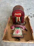 Coca Cola landline phone and radio.