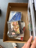 Devil egg Tupperware, CD's, Hamilton Beach hand mixer/blender, assorted glasses.